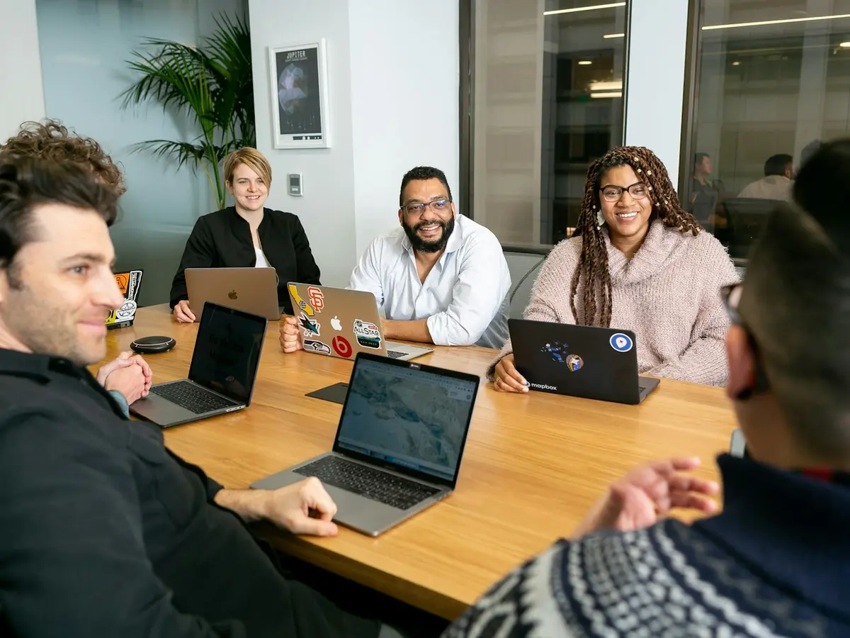 A nonprofit team working together around a table